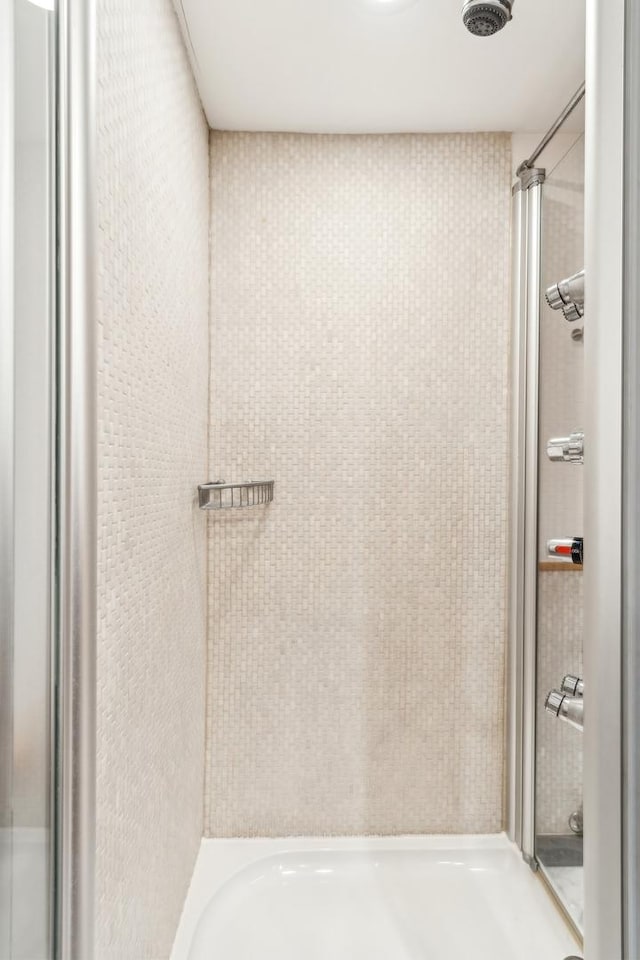 bathroom featuring walk in shower