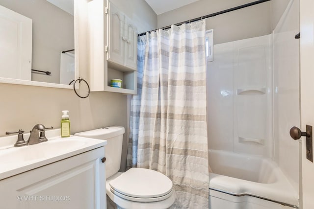 full bathroom with vanity, shower / bath combination with curtain, and toilet