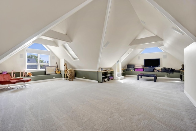 additional living space with carpet and vaulted ceiling with skylight