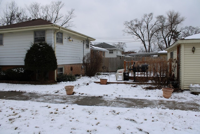 view of snow covered property