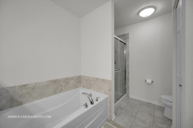 bathroom featuring tile patterned flooring, plus walk in shower, and toilet