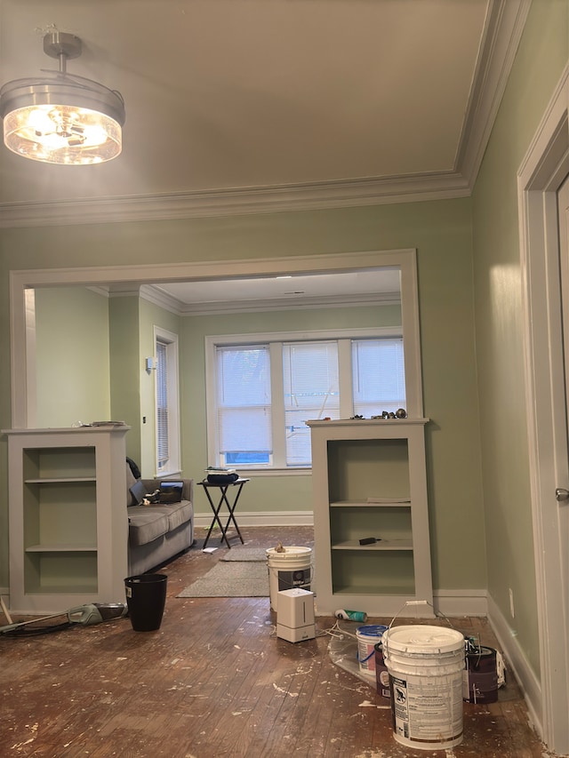 misc room featuring ornamental molding and hardwood / wood-style flooring