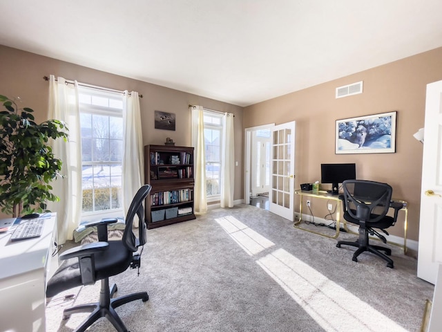 view of carpeted office space