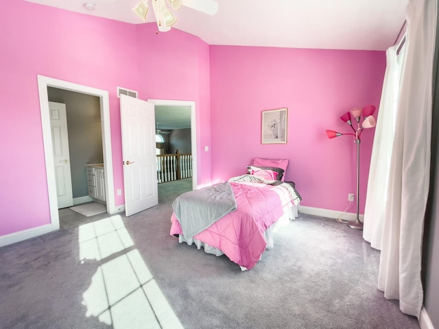 bedroom with ensuite bathroom, ceiling fan, and carpet