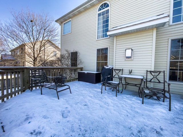 view of snow covered deck