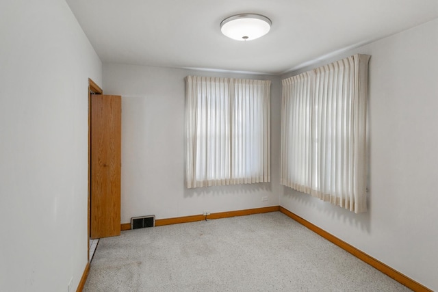 empty room featuring carpet