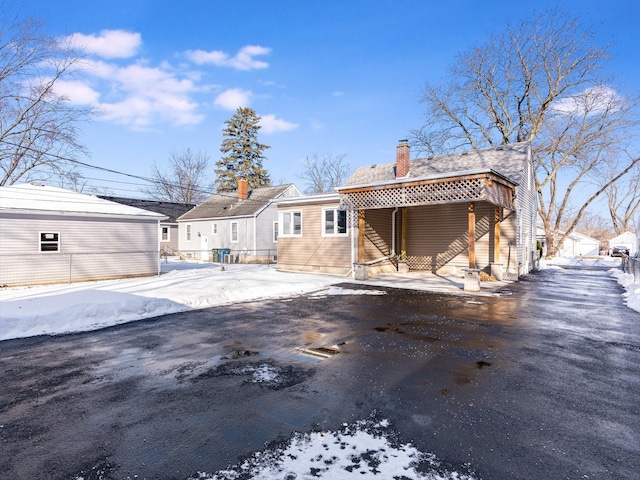 view of snow covered property