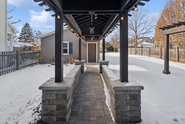 view of snow covered patio