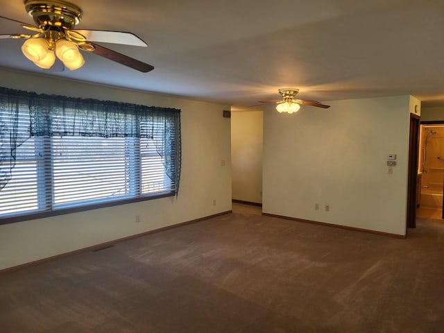 unfurnished room with carpet floors and ceiling fan