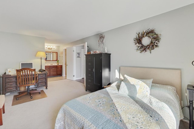 carpeted bedroom featuring connected bathroom