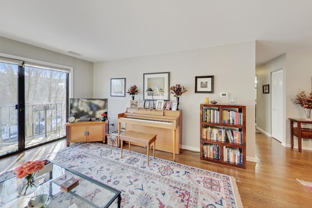 miscellaneous room with hardwood / wood-style floors