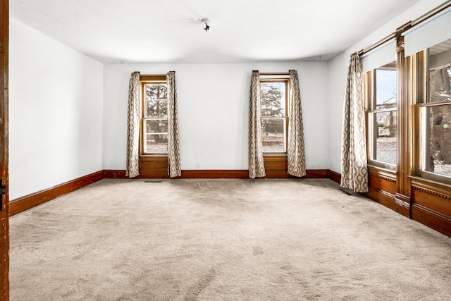 spare room featuring carpet flooring