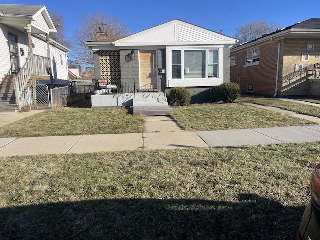 bungalow with a front yard