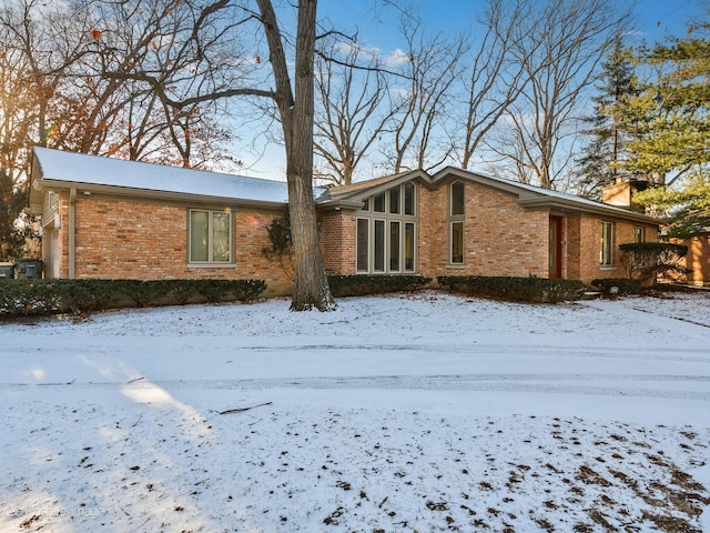 view of snow covered property