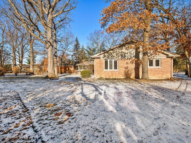 view of snow covered property