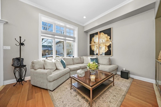 living room featuring ornamental molding and hardwood / wood-style flooring