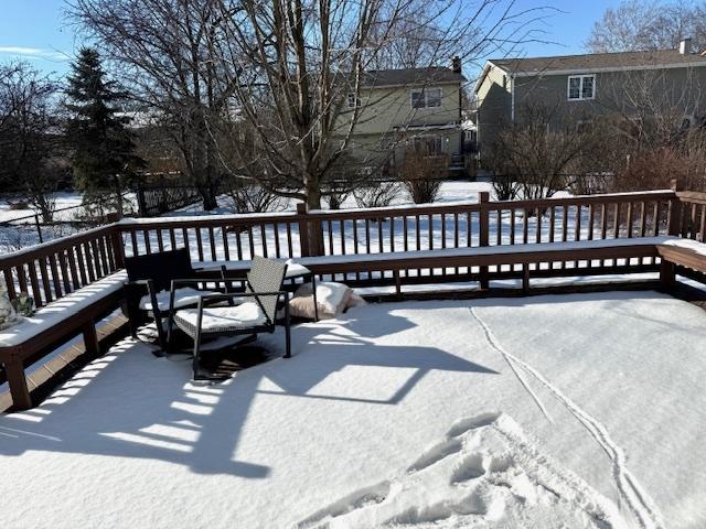 view of snow covered deck