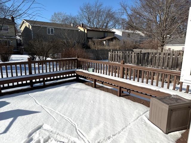 view of snow covered deck