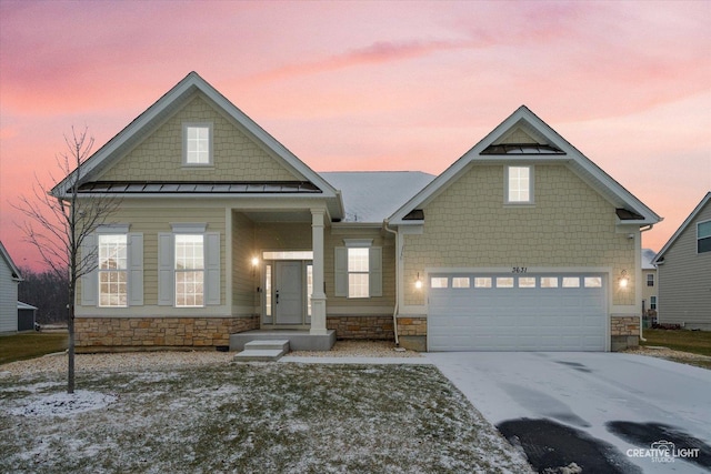 view of front of property featuring a garage