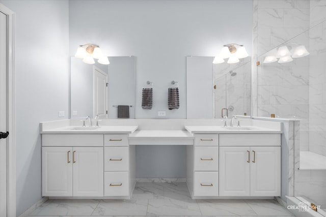 bathroom with vanity and a shower with door