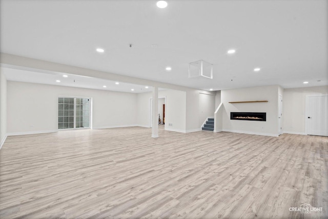 basement featuring light wood-type flooring