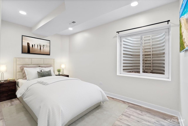 bedroom featuring light wood-type flooring