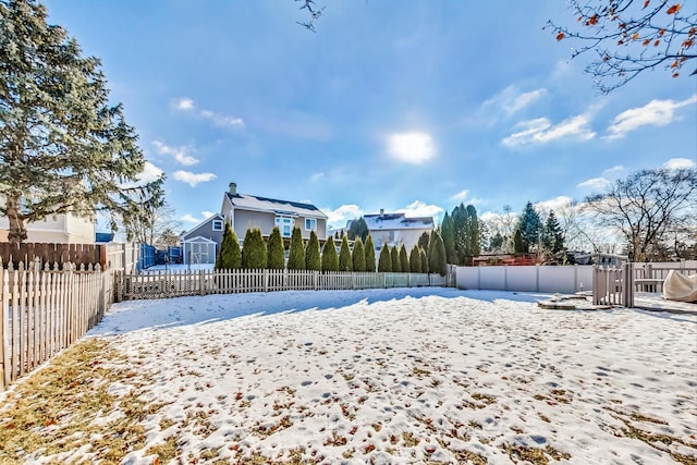 view of yard covered in snow