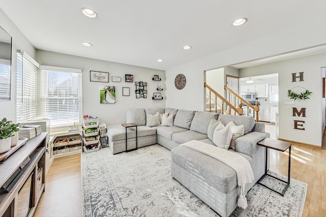 living room with light hardwood / wood-style floors