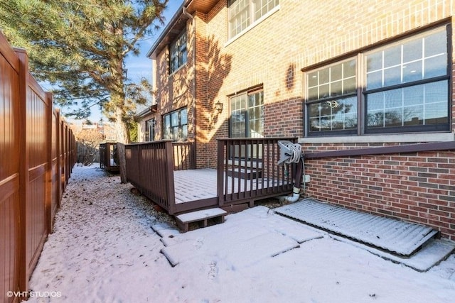 view of snow covered deck