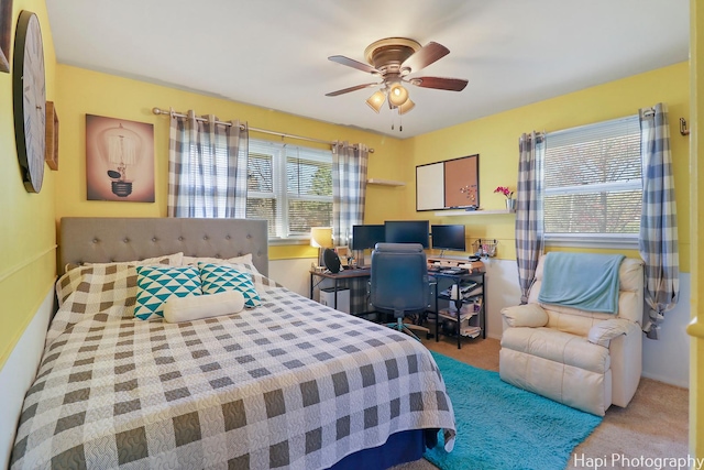 bedroom featuring ceiling fan and carpet flooring