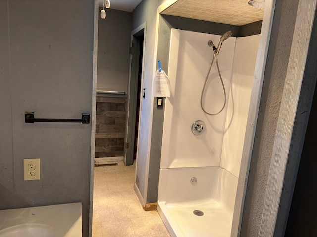 bathroom featuring sink and walk in shower