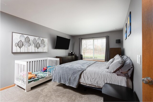 bedroom featuring carpet flooring