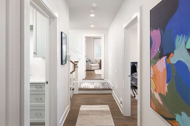 hallway featuring dark hardwood / wood-style floors