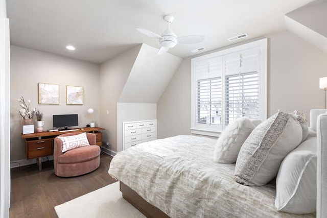 bedroom with lofted ceiling, hardwood / wood-style floors, and ceiling fan