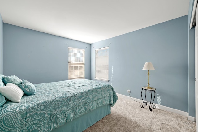 bedroom featuring carpet