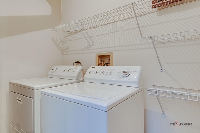 laundry room with washer and dryer