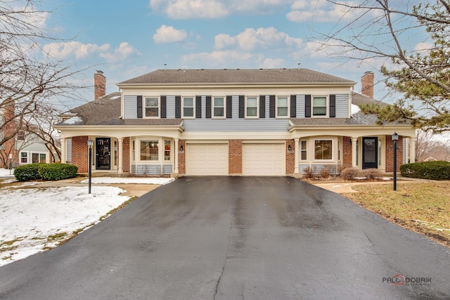 front of property with a garage