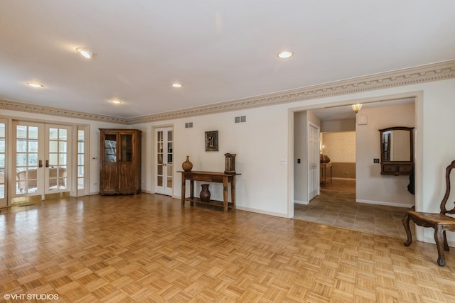 living room with french doors and light parquet flooring