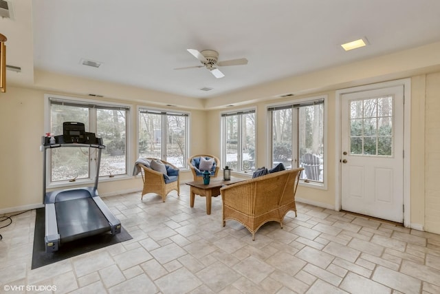 interior space featuring ceiling fan