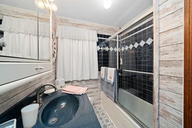 bathroom with enclosed tub / shower combo and vanity