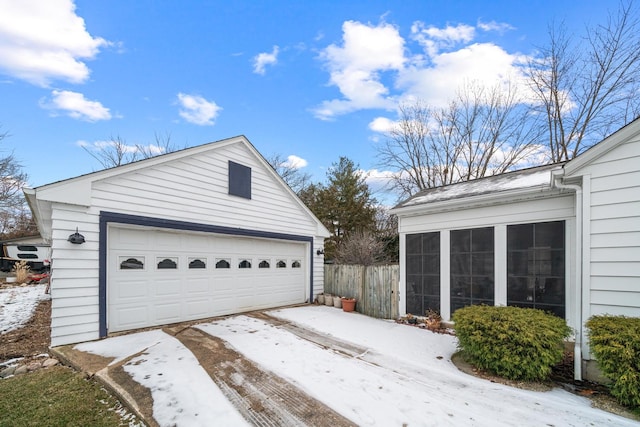 view of snow covered garage