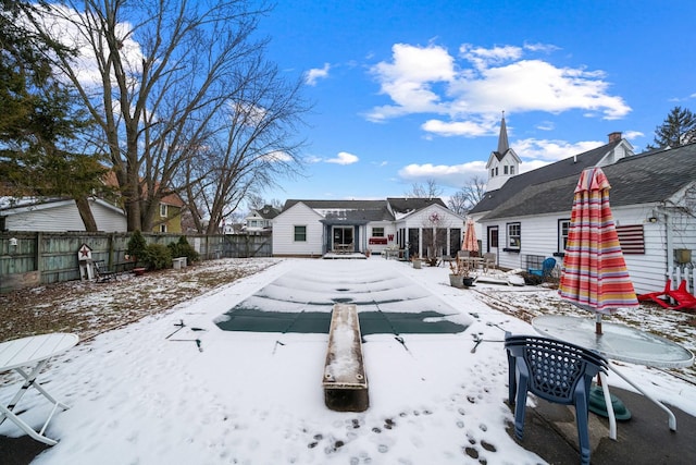 view of yard layered in snow