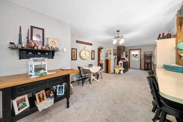 office space featuring light carpet and a chandelier