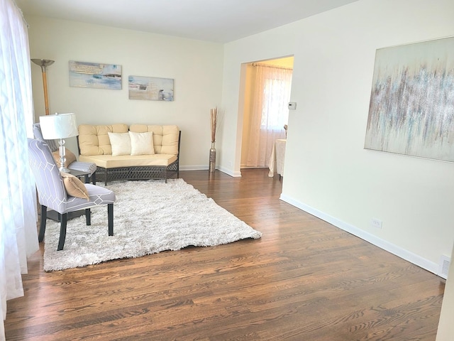 living room featuring dark hardwood / wood-style floors