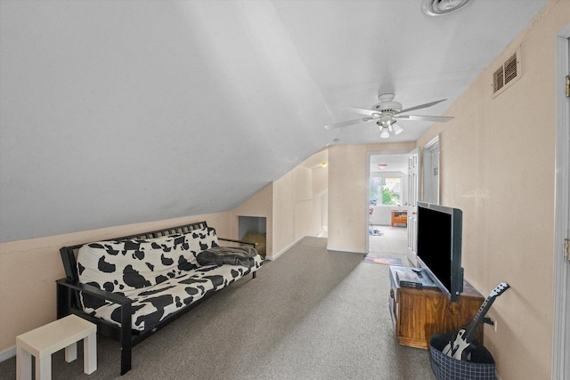 carpeted living room featuring vaulted ceiling and ceiling fan