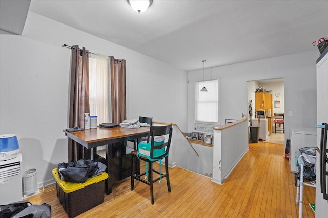 dining room with light wood-type flooring