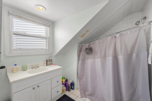 bathroom with a shower with curtain, tile patterned flooring, and vanity