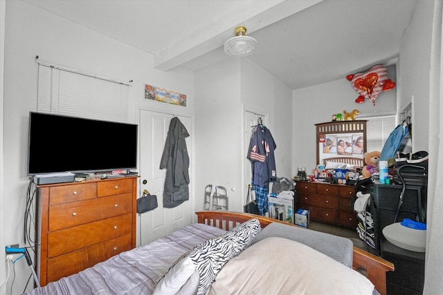 bedroom with beamed ceiling