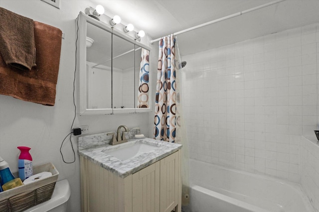 full bathroom featuring toilet, vanity, and shower / tub combo with curtain