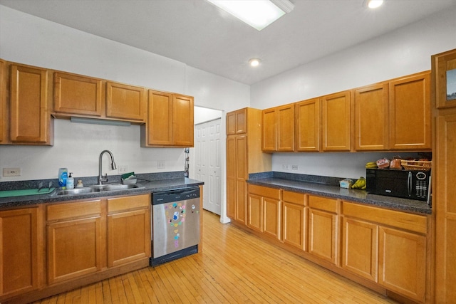 kitchen with light wood-type flooring, dishwasher, and sink